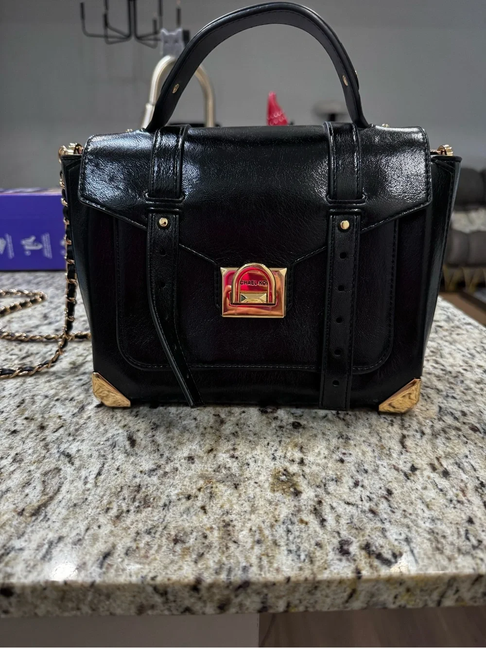 Michael Kors Black Satchel with Gold-Tone Hardware
